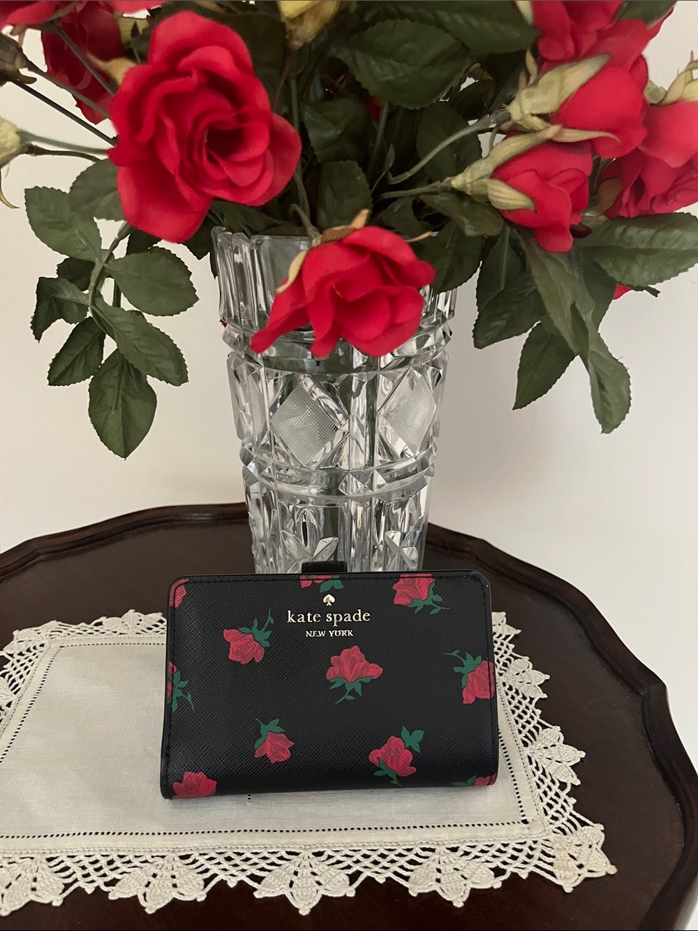 Kate spade Madison bifold wallet rose pattern.